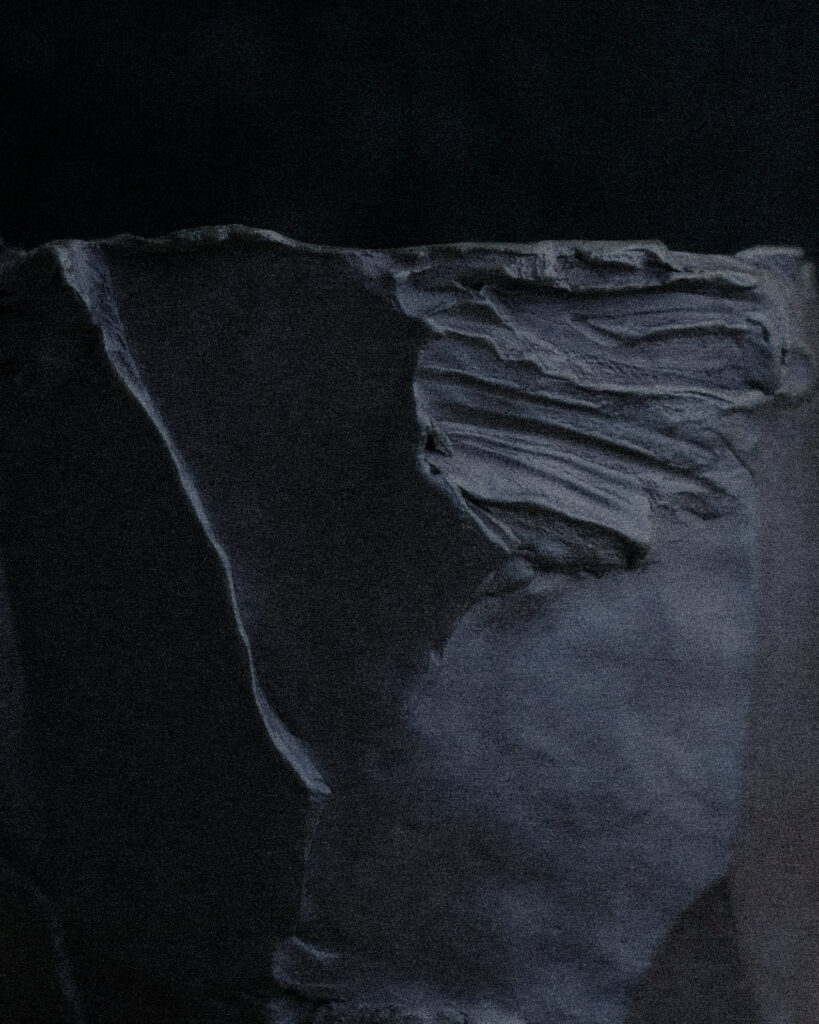 Close-up of interior wall of large kurinuki vessel — rough carved texture and torn clay rim, Ondou Studio