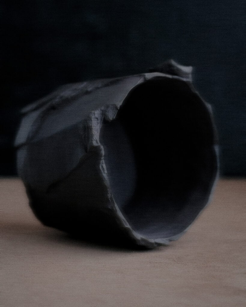 Large kurinuki vessel lying on its side revealing interior profile and hand-carved rim — one-of-a-kind ceramic object by Ondou Studio